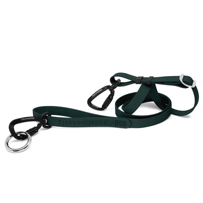 Lead-All Pro Extra - Dark green or forest green-coloured adjustable dog leash made of biothane. There are black auto-locking carabiner clips on either end. TinyHorse is stamped onto the leash handle