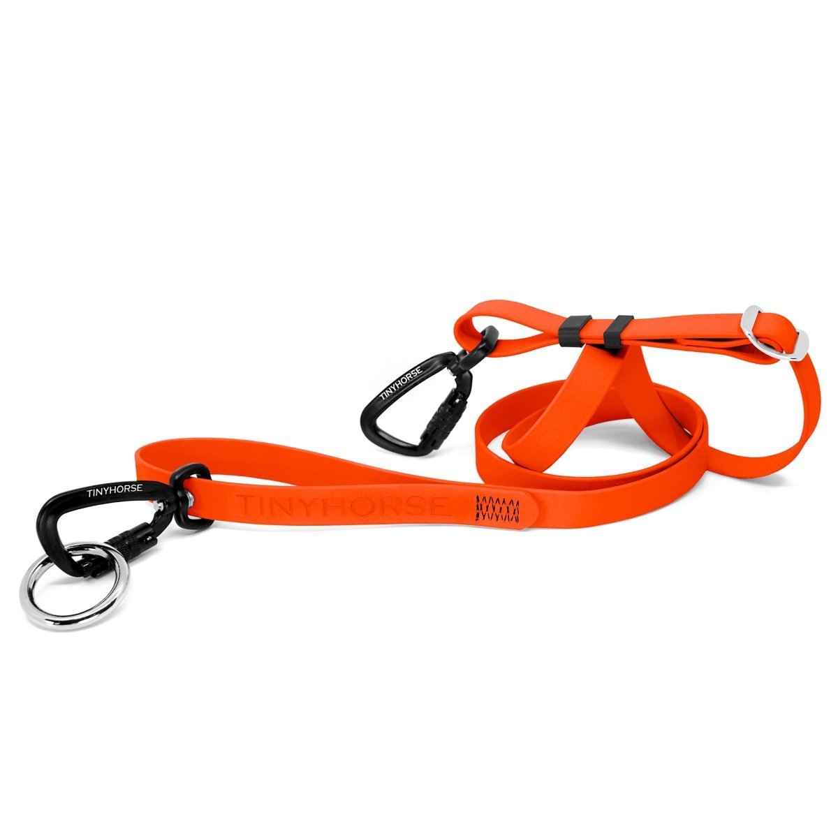 Lead-All Pro Extra - Neon Orange-coloured adjustable dog leash made of biothane. There are black auto-locking carabiner clips on either end. TinyHorse is stamped onto the leash handle