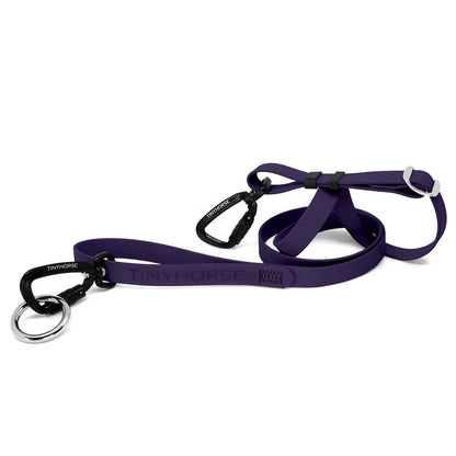 Lead-All Pro Extra - dark purple-coloured adjustable dog leash made of biothane. There are black auto-locking carabiner clips on either end. TinyHorse is stamped onto the leash handle