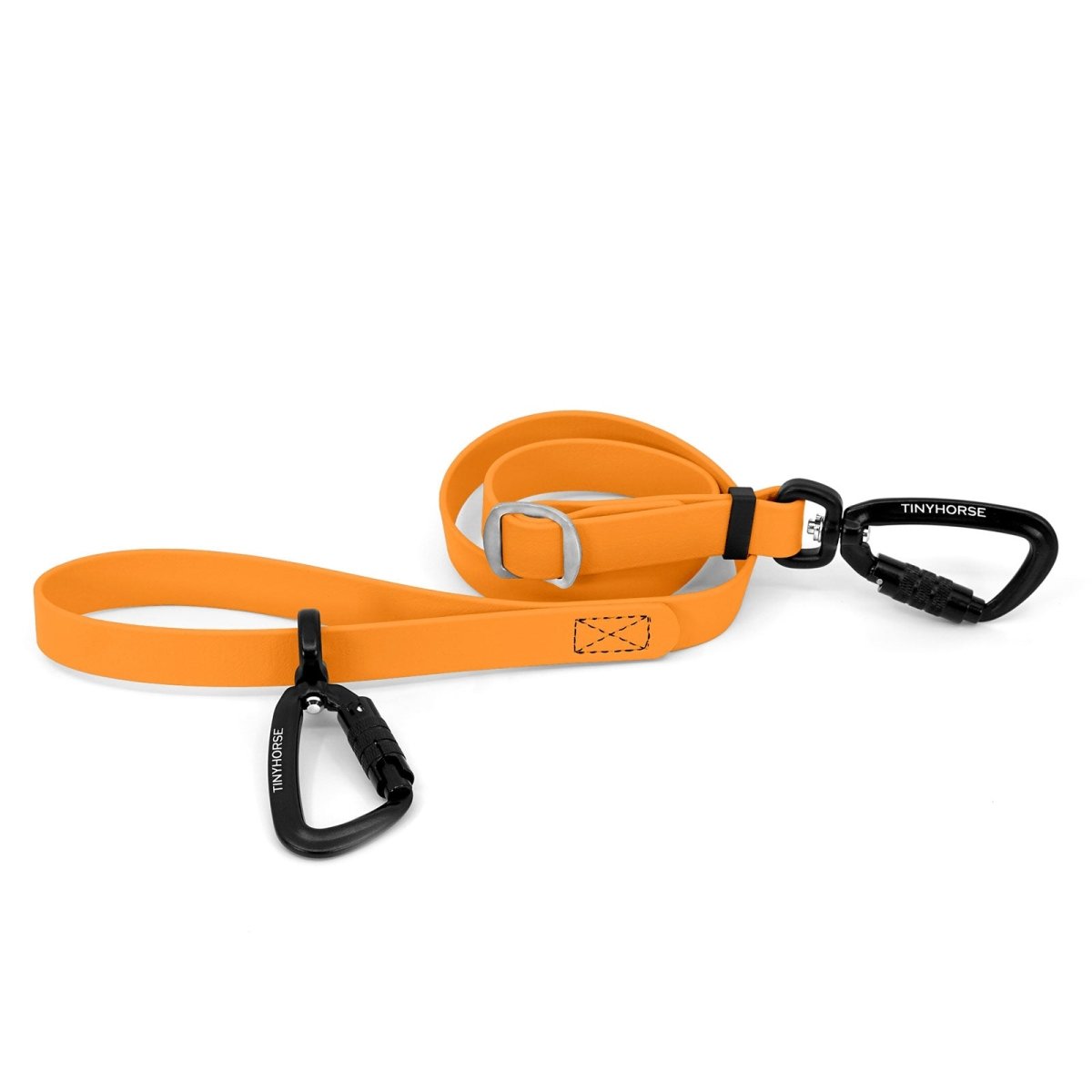 An adjustable creamsicle-coloured Lead-All Pro made of BioThane with 2 auto-locking carabiners